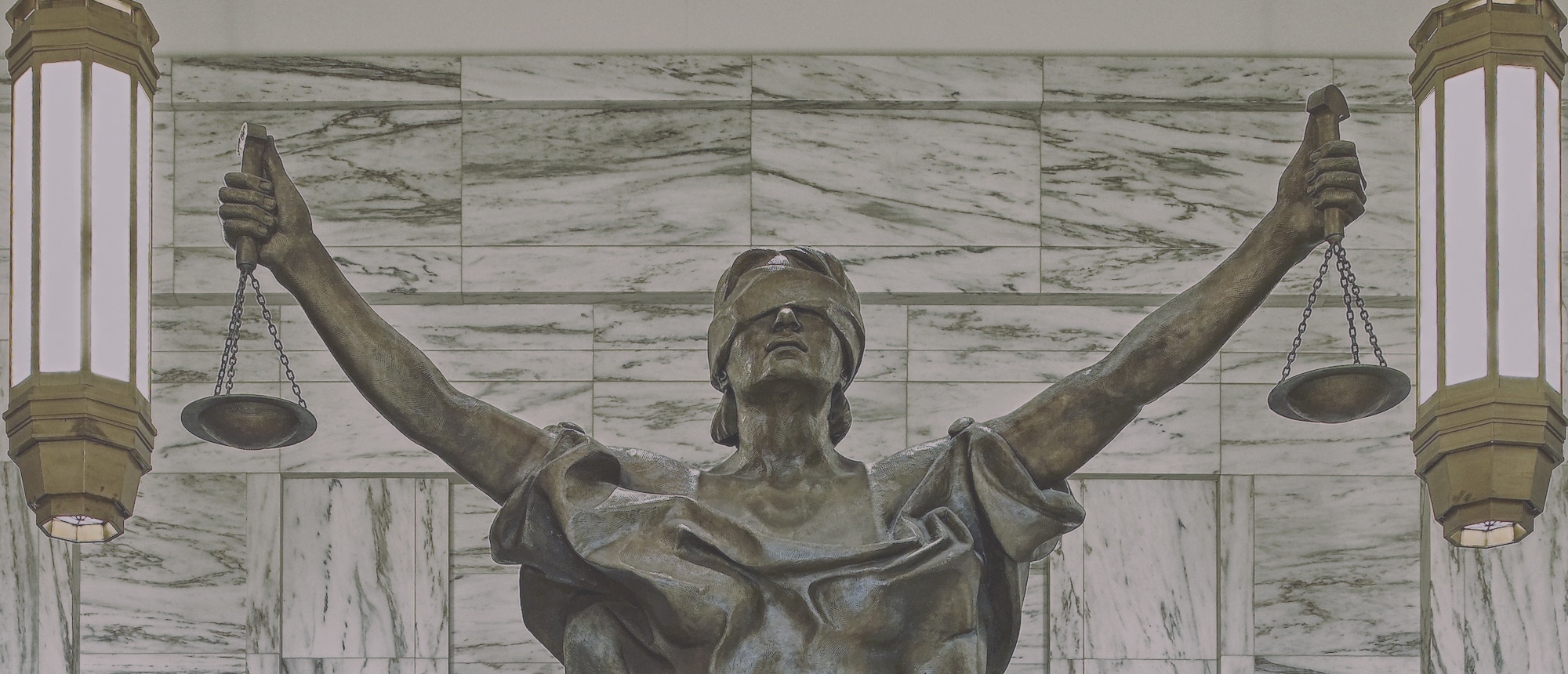 Domestic Violence Chandler - statue of lady justice holding scales