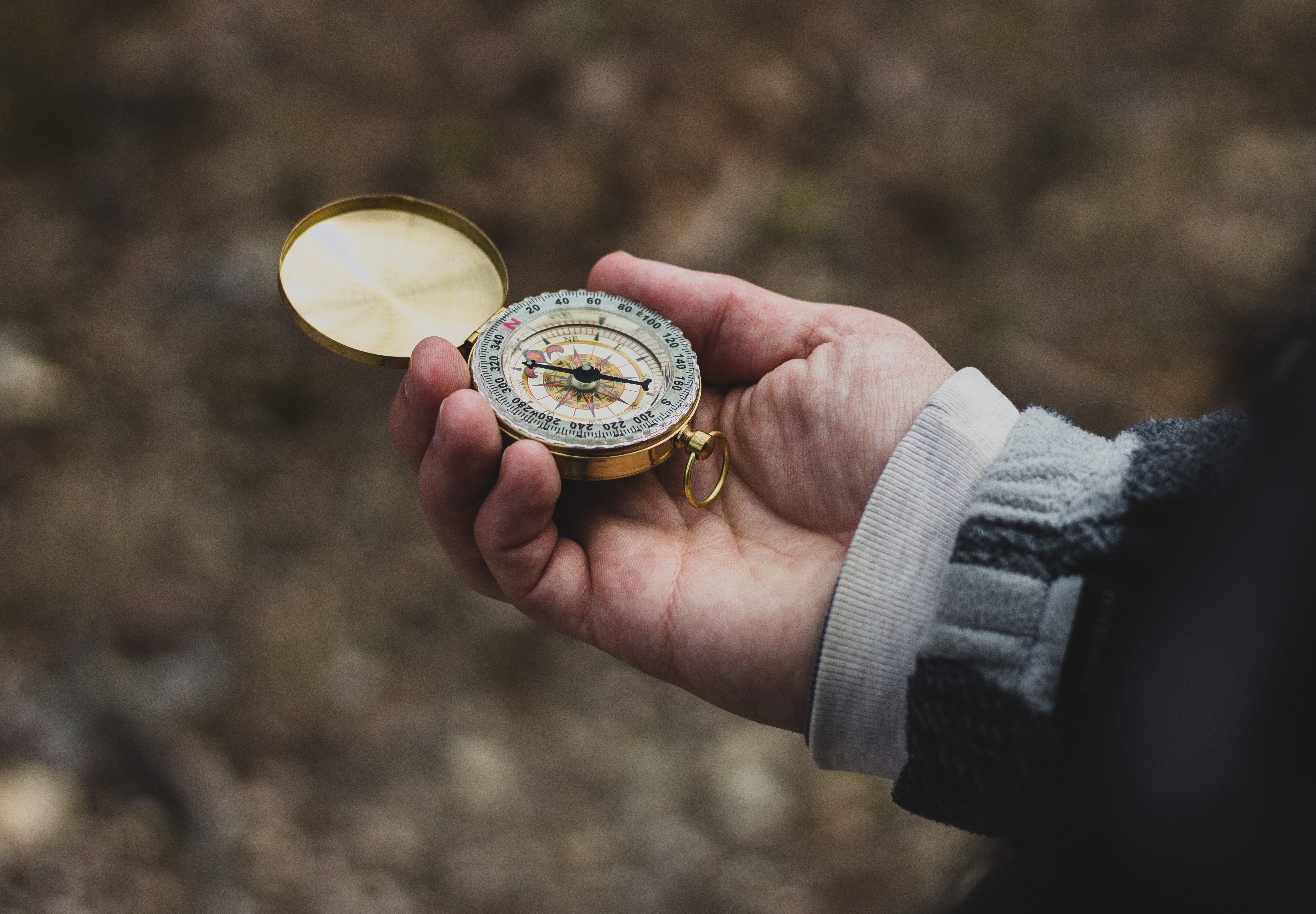 defense attorney in Phoenix, AZ - person's hand holding a pocket compass