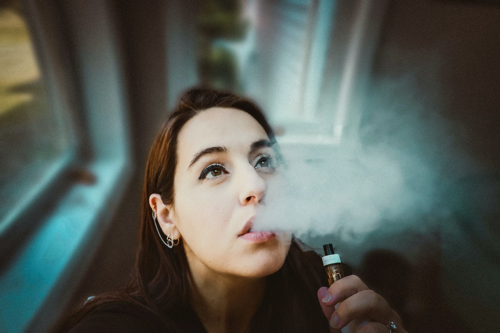 vape laws in arizona 2021 -- woman vaping