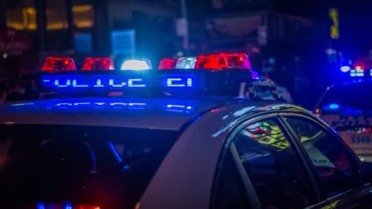 are dui checkpoints unconstitutional -- top of a police car