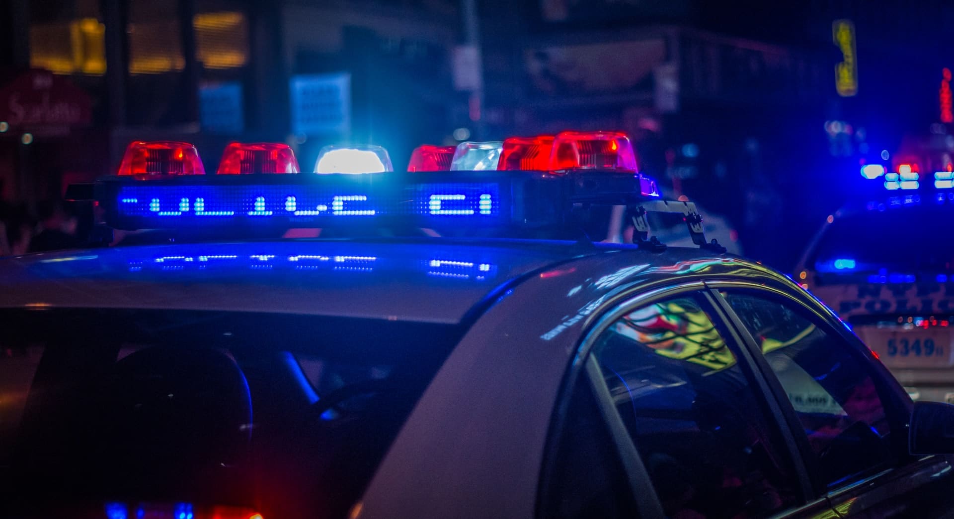 are dui checkpoints unconstitutional -- top of a police car