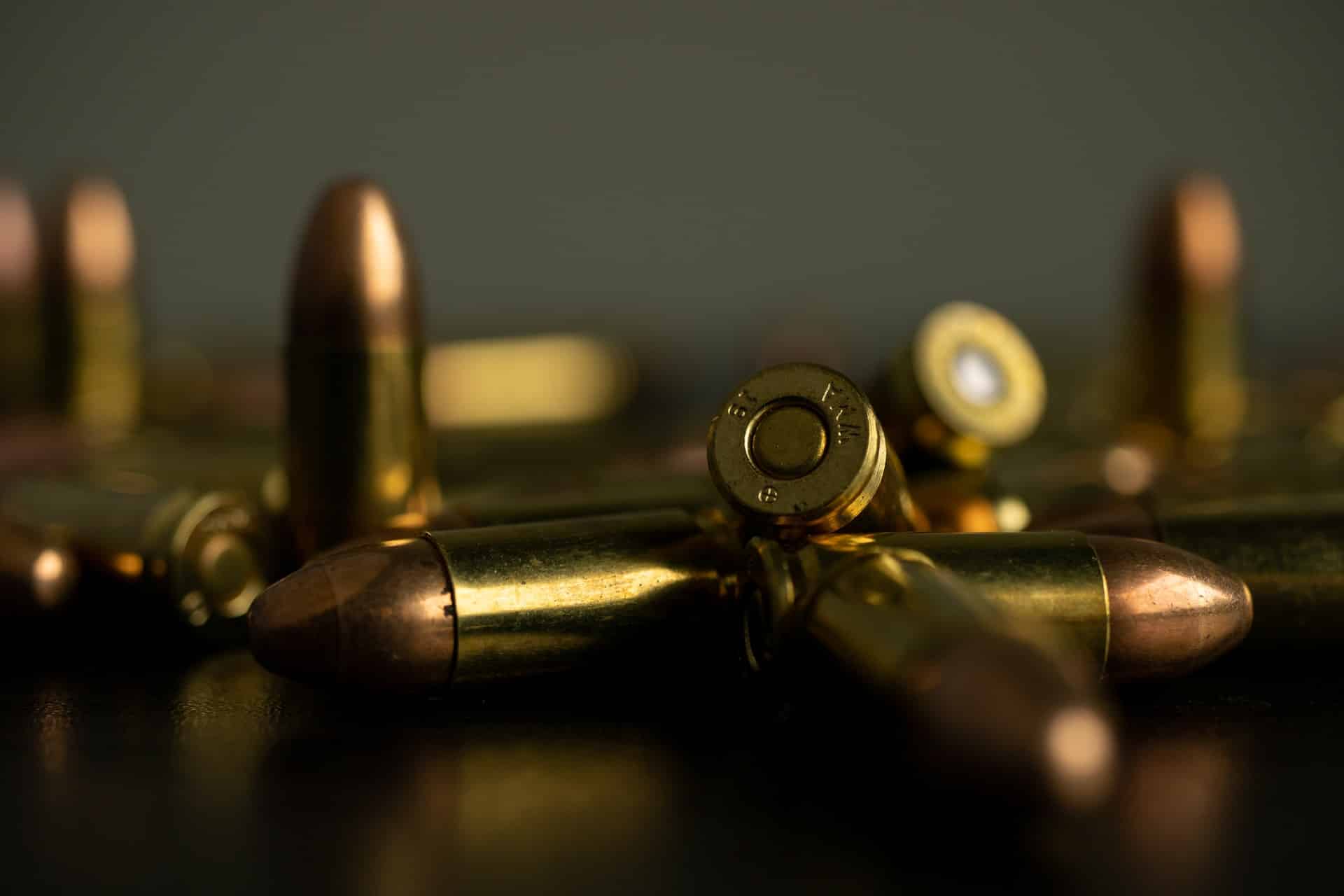 ammo on a table - firearm trafficking
