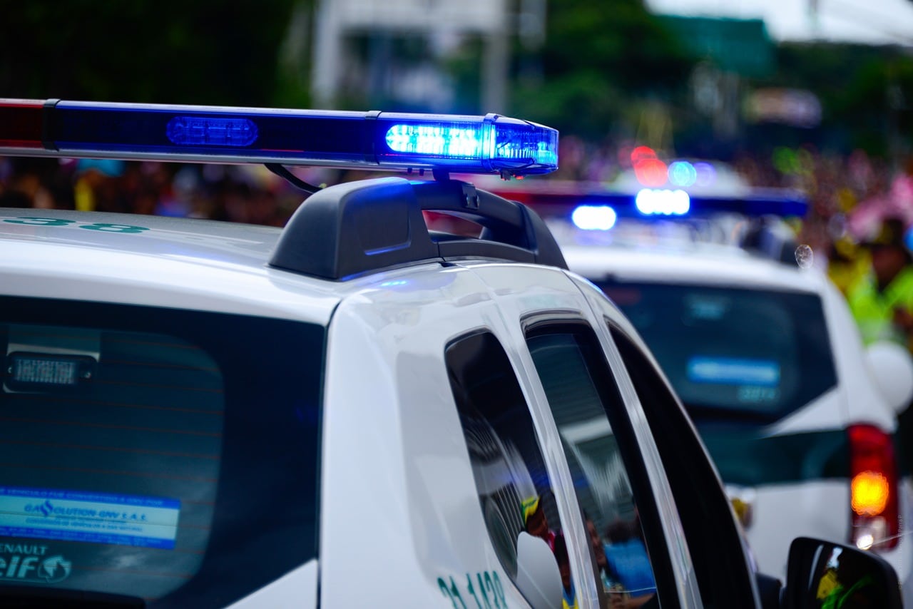 Police car watching traffic - moving violations in arizona