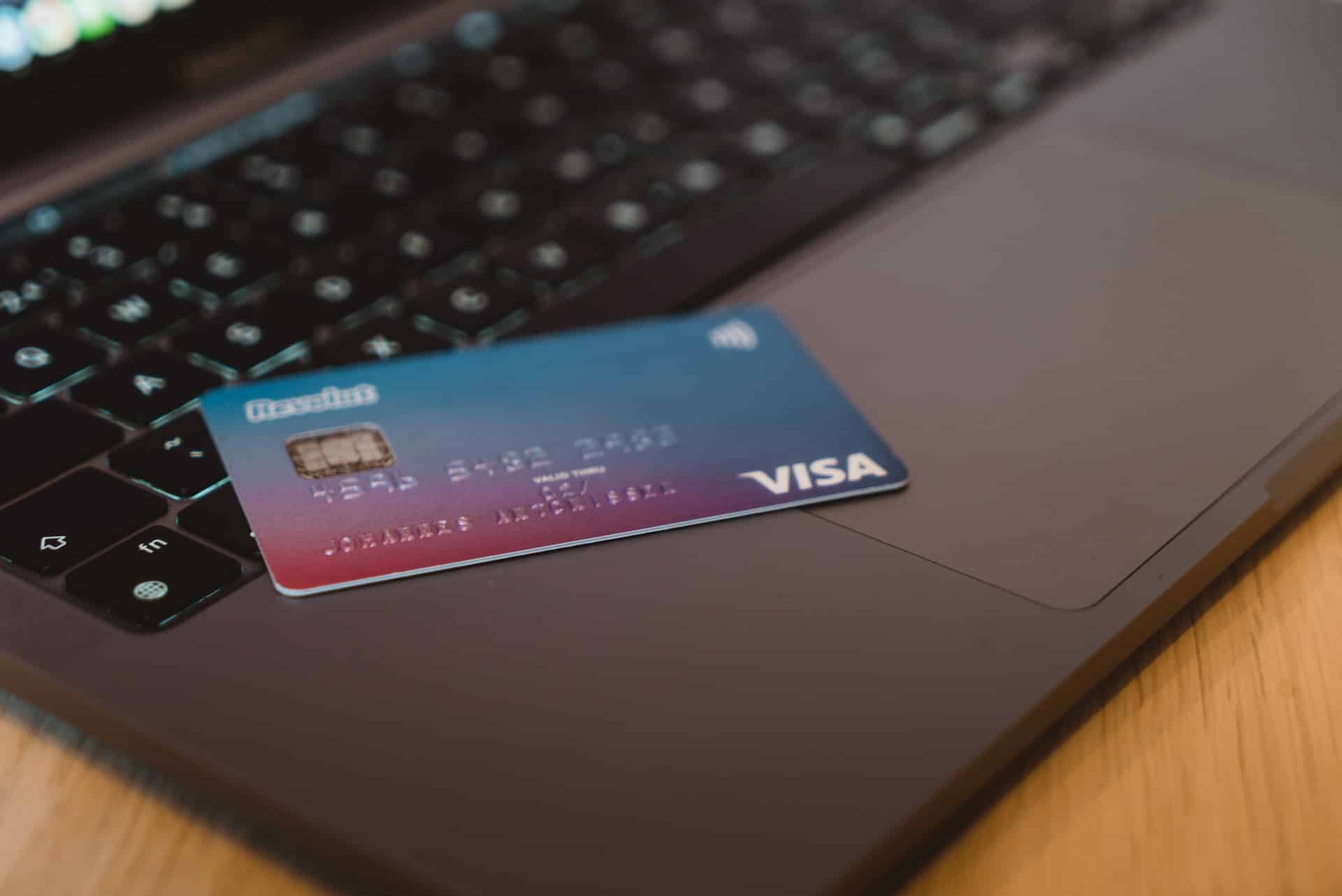credit card sitting on a laptop - fraud in Arizona